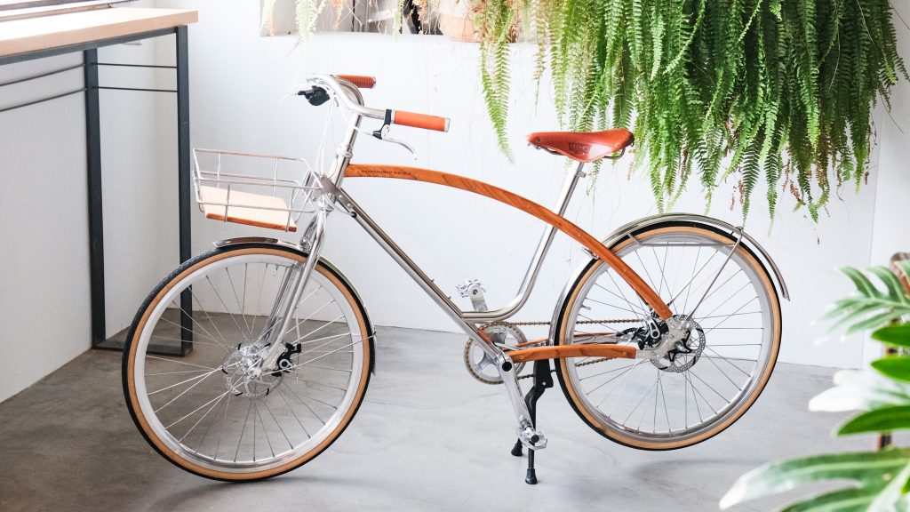 NTCRI and AOI CYCLE intertwine metal and woodworking for craftsmanship bicycle project